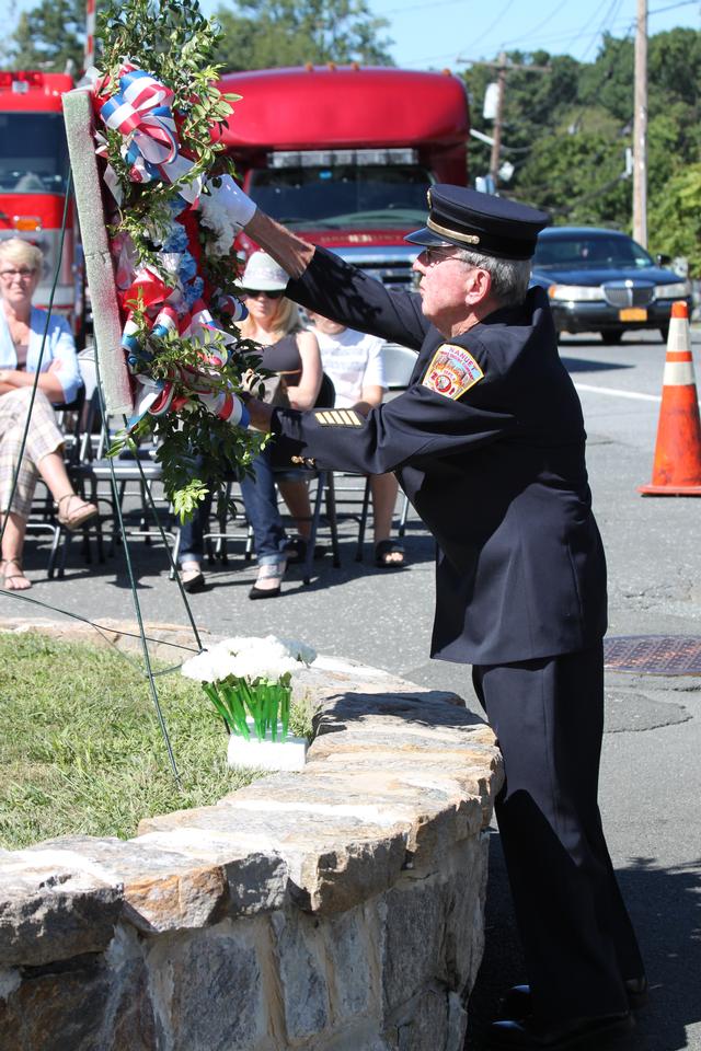 Flower placed for members from 186o to 1920 by Jack Reilly.

Memorial Service NFD. September 9, 2012. Photo by Vincent P. Tuzzolino
